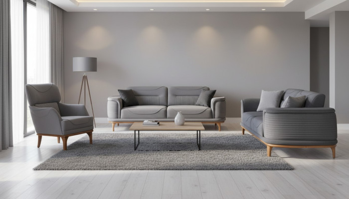 Luxurious upholstered suite in gray: Two three-seater sofas & armchair new