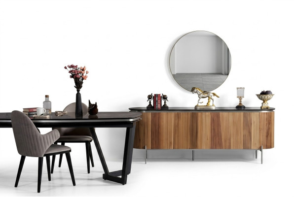 Luxurious dining room set consists of a modern black sideboard and mirror.