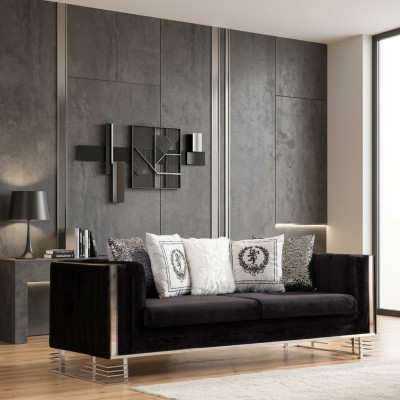Black designer three-seater living room couch with metal frame