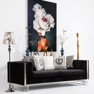 Black designer three-seater living room couch with metal frame