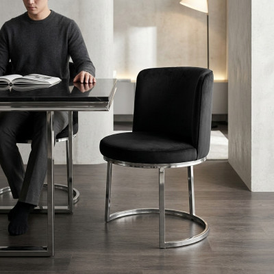 Black designer chair with stainless steel base, modern dining chairs, new.