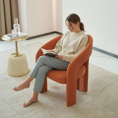 Orange armchair living room chair single-seater upholstered seating lounge relax.