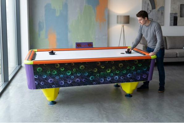 Modern air hockey table made of multicolored plastic and aluminum