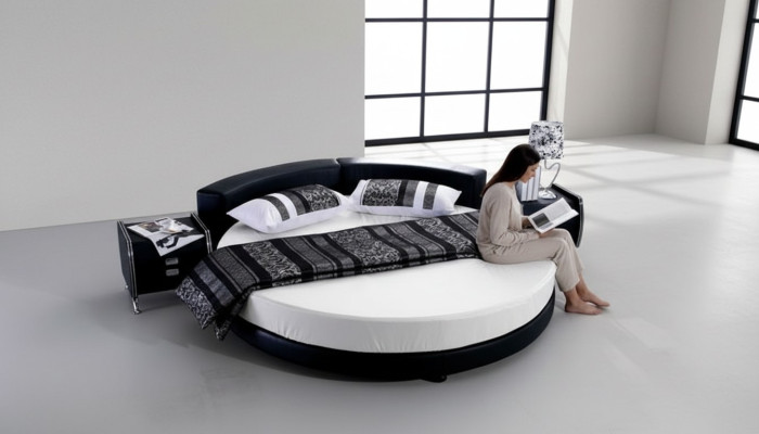 Modern black bed with elegant details and bench