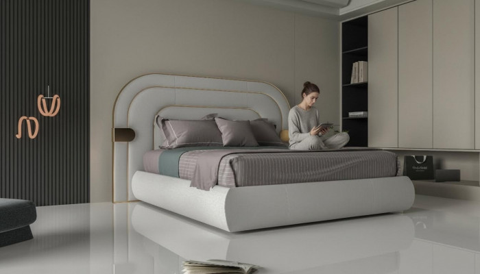 Luxury gray bed guard with golden details in modern design and soft upholstery