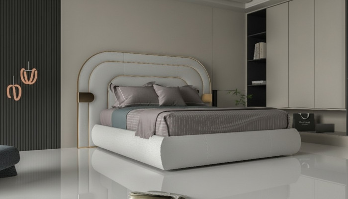 Luxury gray bed guard with golden details in modern design and soft upholstery