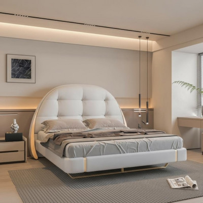 Bedding made of luxurious fabric with embroidered details and modern round headboard