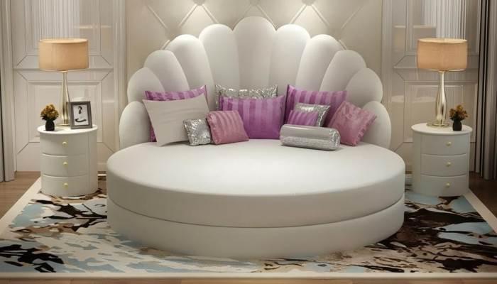 Elegant round white bed with purple velvet upholstery for modern bedroom