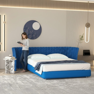 Blue fabric bed with upholstered headboard