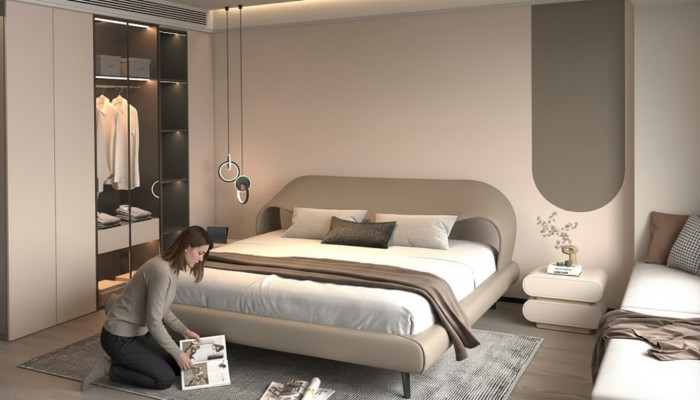 Bed with elegant design and rounded shapes
