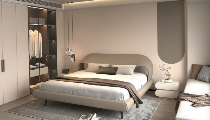 Bed with elegant design and rounded shapes