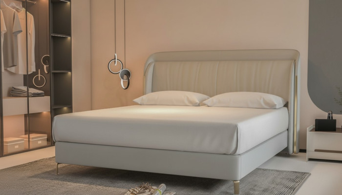 Modern luxury bed with elegant gold headboard in gray color