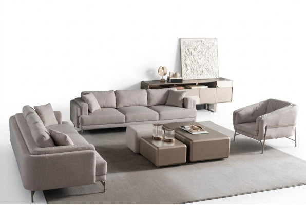 Beige living room with modern sofa and armchair