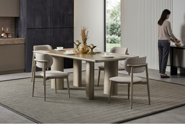 Elegant beige table with wooden legs and 4 fabric chairs
