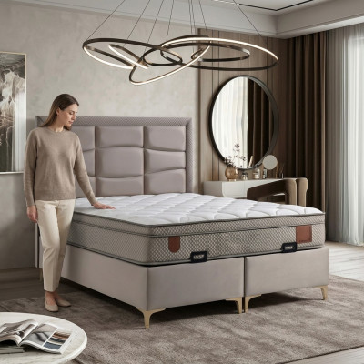 Beige bed with fabric and wood pillow