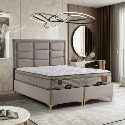 Beige bed with fabric and wood pillow