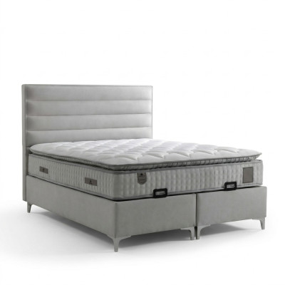 Bed made of modern gray textile with elegant mattress