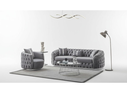 Das Sofa mit Sessel ergänzt die Einrichtung mit Ästhetik und Stil.