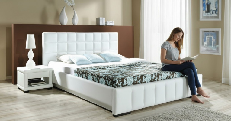 A luxurious designer bed in an elegant contemporary style of the highest quality
